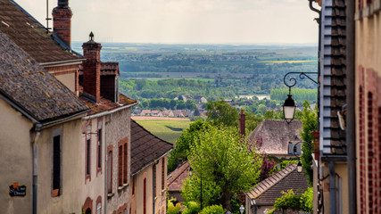 Brown roofs of village in Champagne region with marvellous view on vineyards and hills, France - 224944069