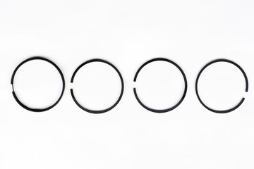 tractor piston rings on isolated white background