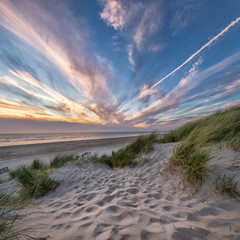 Water-colour sky and white sand of La Manche beach in Berck, France - 224944612