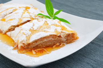 Apple pie (strudel) on the table