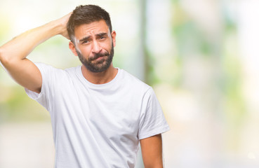 Adult hispanic man over isolated background confuse and wonder about question. Uncertain with...