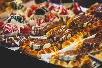 Aluminium Prints Dessert Stroopwafel, stroop wafel, also known as syrup waffle, is one of the famous Dutch snack from The Netherlands, counter with different candy desserts, sweet tasty candy dessert variety in Amsterdam