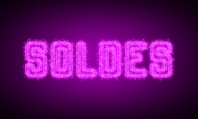 SOLDES - pink glowing text at night on black background