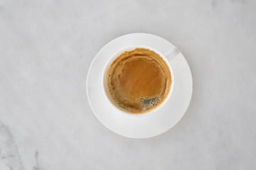 A cup of coffee on marble background