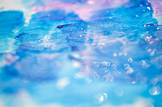 shimmering creative blue pink background. Bubbles in water