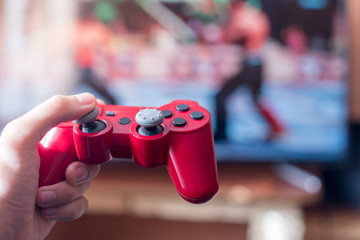 Man is playing on the console