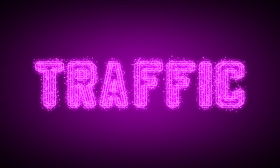 TRAFFIC - pink glowing text at night on black background