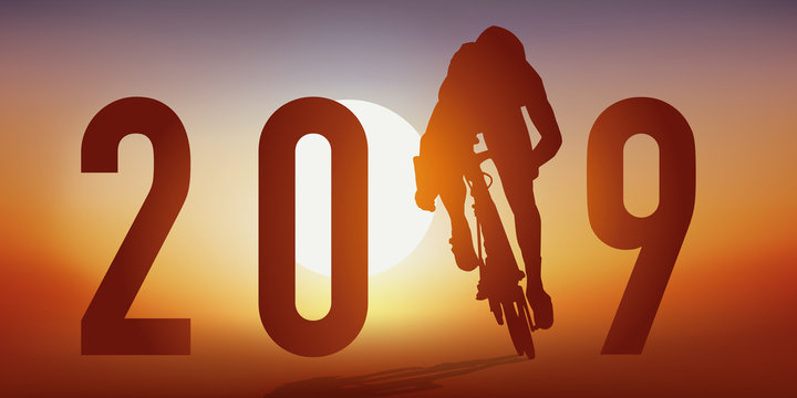 Carte de vœux 2019 sur le thème du cyclisme avec un cycliste en pleine action, qui passe la ligne d’arrivée