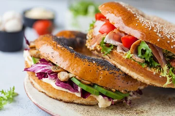 Foto op Plexiglas sandwich in a bagel © A.Kazak