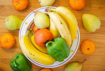 Fruit Bowl on Wooden Background