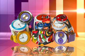 Many women's, colorful wrist watches on a multi-colored background