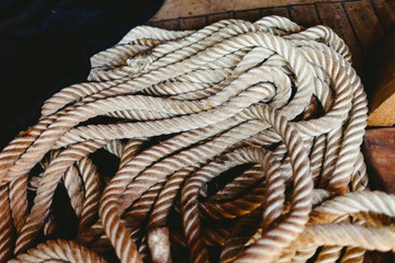 Knotted boat ropes to hold sails.