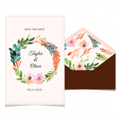 save the date card and envelope with watercolor floral wreath