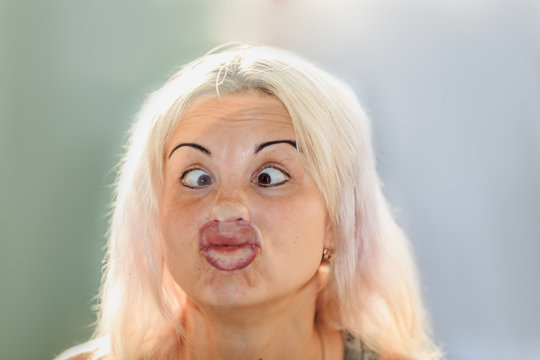 Female Face Pressed Against Glass Or Window