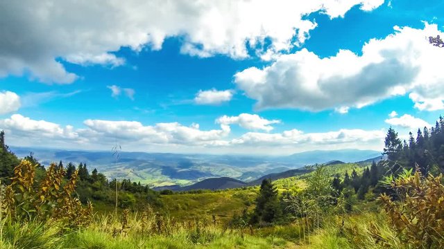 Picturesque landscape of Carpathian mountains in early autumn. View from mount Pikui (1405m), Carpathians, Ukraine. Time Lapse. 4K UltraHD