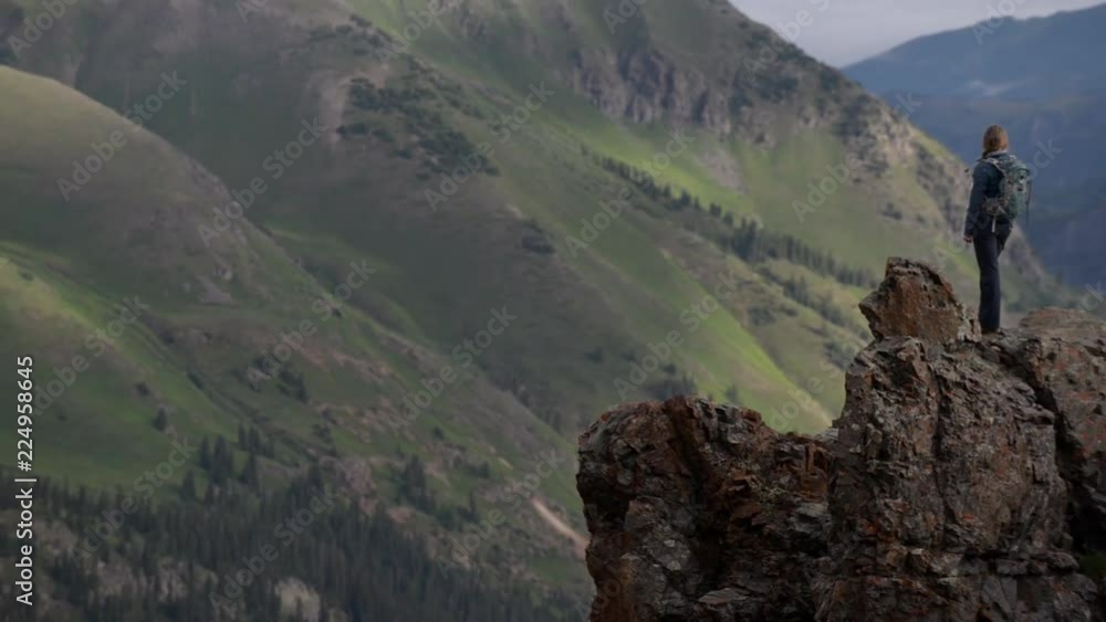 Wall mural Tourist admires view from California Pass towards lake Como and Poughkeepsie Gulch