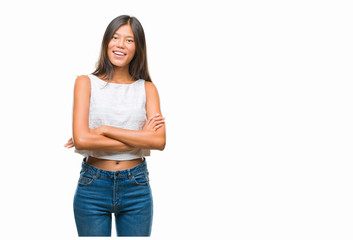 Young asian woman over isolated background happy face smiling with crossed arms looking at the camera. Positive person.