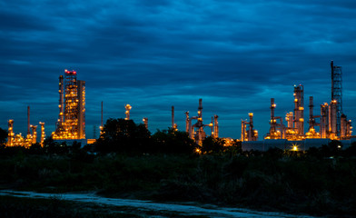 View of oil and gas refinery industry plant at twilight, Electric Generating factory at night.