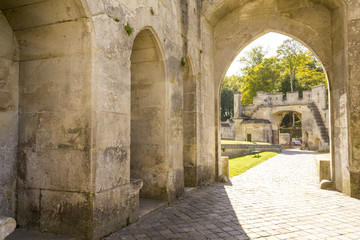 Medieval castle of Pierrefonds, Picardy, France. Arch to interior courtyard with crenelations and...