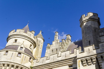 Medieval castle of Pierrefonds, Picardy, France. Exterior with crenelations and turrets