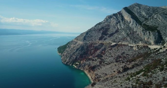 Drone shot of sea with mountain, Brela, Croatia