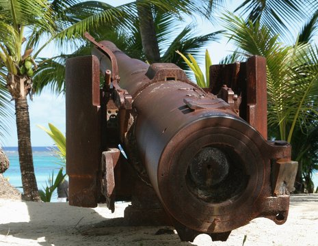 Back view close up of the relics of a World War 11 Japanese cannon preserved at Managaha Island, Saipan, Northern Mariana Islands
