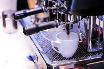 Barista working in a coffee shop, Close up of barista presses ground coffee using tamper, Barista Make Coffee Portafilter Concept