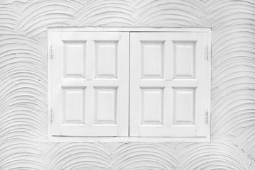 Rough plastered walls with old window as background