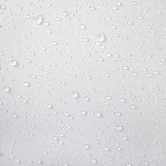 Water drops on waterproof fabric background. Raindrops on white umbrella. - obrazy, fototapety, plakaty