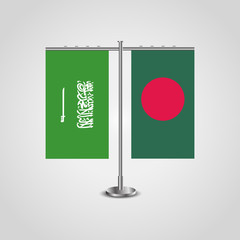 Table stand with flags of Saudi Arabia and Bangladesh.Two flag. Flag pole. Symbolizing the cooperation between the two countries. Table flags