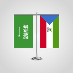 Table stand with flags of Saudi Arabia and Equatorial Guinea.Two flag. Flag pole. Symbolizing the cooperation between the two countries. Table flags