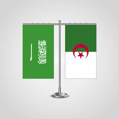 Table stand with flags of Saudi Arabia and Algeria.Two flag. Flag pole. Symbolizing the cooperation between the two countries. Table flags