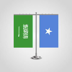 Table stand with flags of Saudi Arabia and Somalia.Two flag. Flag pole. Symbolizing the cooperation between the two countries. Table flags