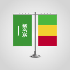 Table stand with flags of Saudi Arabia and Mali.Two flag. Flag pole. Symbolizing the cooperation between the two countries. Table flags