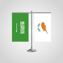 Table stand with flags of Saudi Arabia and Cyprus.Two flag. Flag pole. Symbolizing the cooperation between the two countries. Table flags