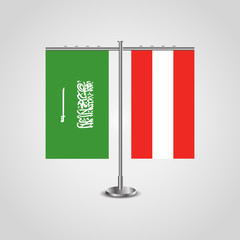 Table stand with flags of Saudi Arabia and Austria.Two flag. Flag pole. Symbolizing the cooperation between the two countries. Table flags