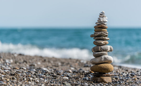 Stone Stack on a Beach in Italy