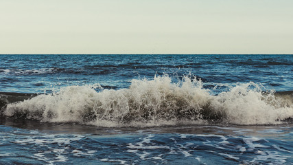 Powerful sea waves breaking, natural background