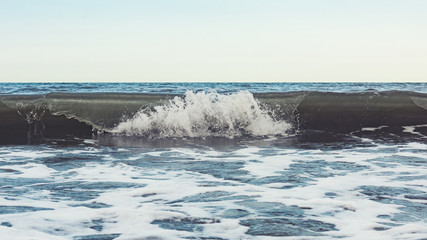 Powerful sea waves splash, natural background