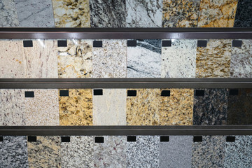 hanging granite color and pattern samples in the store