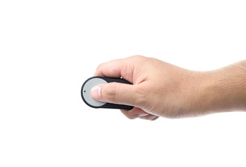 male hand is pressing the button remote isolated on white background