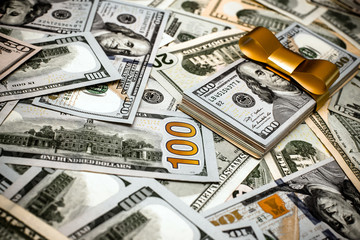 Fototapeta premium a pack of lies the US currency on background of dollars 