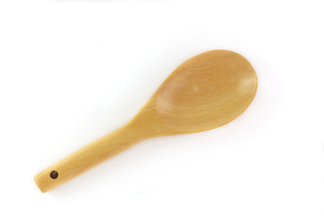 Wooden spoon isolated on a white background.