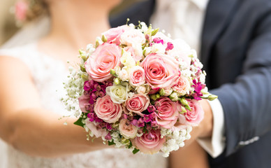 bridal bouquet with bridal couple