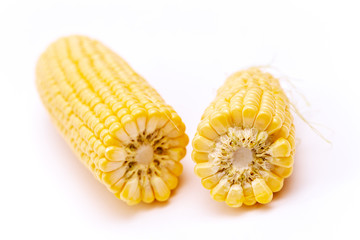 Broken corn cobs isolated on white.