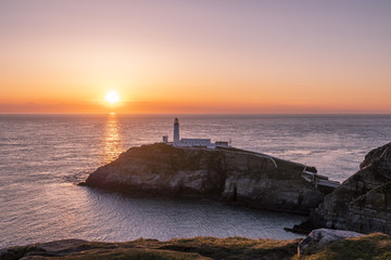 Fototapeta na wymiar Sunset at south stack lighthouse on Anglesey in Wales