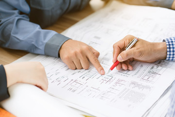 Team Construction asia workers are both engineers and builders are proud to succeed in the design...