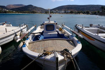 Island of Syros in greece, panorama of Galissa beach with a little fishing boat.