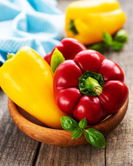 Bell peppers on a wooden background