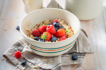 Tasty granola with berry fruits for breakfast